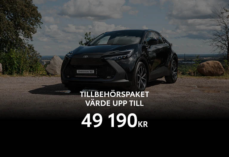 En Toyota C-HR Laddhybrid står parkerad i ett naturskönt område.